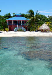 Coral House viewed from ocean with house reef