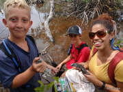 Andrea escorting two young explorers on the Swamper tour