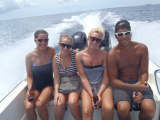 Dolphons racing the boat