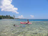 Snorkeler and Kayak
